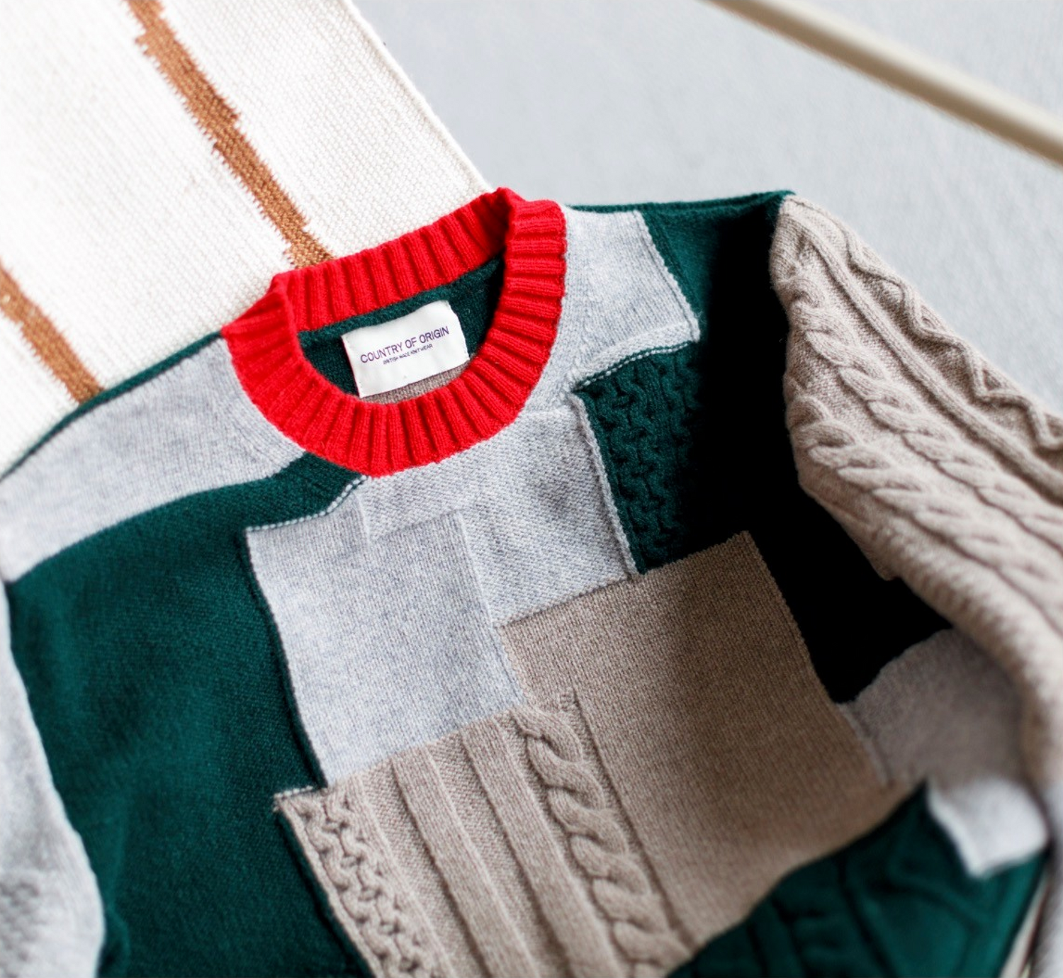 A patchwork style knit sweater.